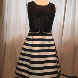 Black, sequined, striped formal dress.